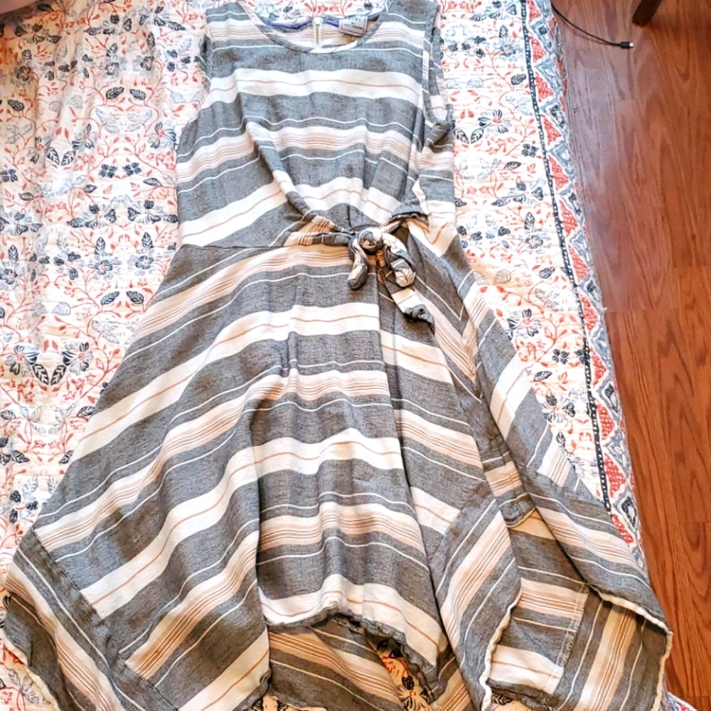 Cute striped dress with handkerchief bottom.